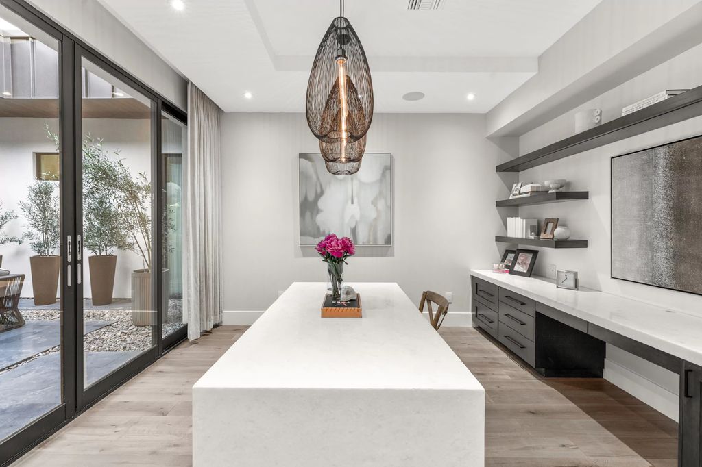 The Las Vegas Estate, a magnificent property has been completely redesigned with the finest quality finishes sitting on a half acre behind the guarded gates of Indigo in The Ridges is now available for sale. This home located at 42 Crested Cloud Way, Las Vegas, Nevada