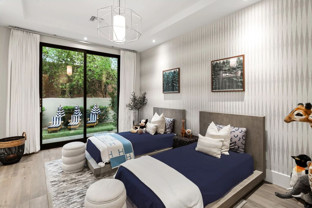 The Las Vegas Estate, a magnificent property has been completely redesigned with the finest quality finishes sitting on a half acre behind the guarded gates of Indigo in The Ridges is now available for sale. This home located at 42 Crested Cloud Way, Las Vegas, Nevada