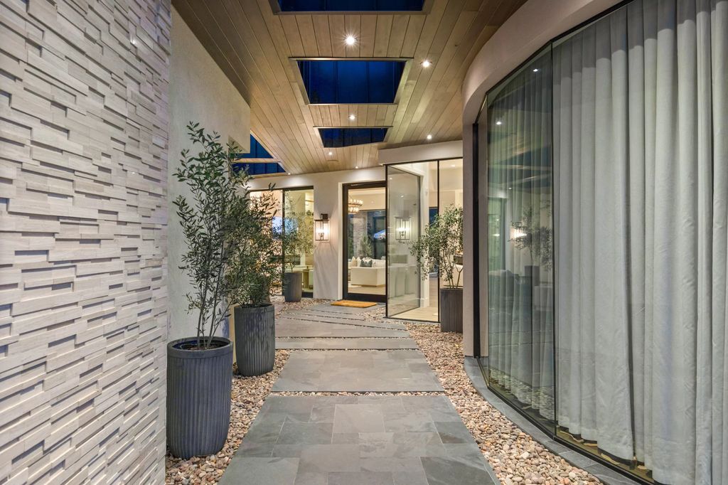 The Las Vegas Estate, a magnificent property has been completely redesigned with the finest quality finishes sitting on a half acre behind the guarded gates of Indigo in The Ridges is now available for sale. This home located at 42 Crested Cloud Way, Las Vegas, Nevada