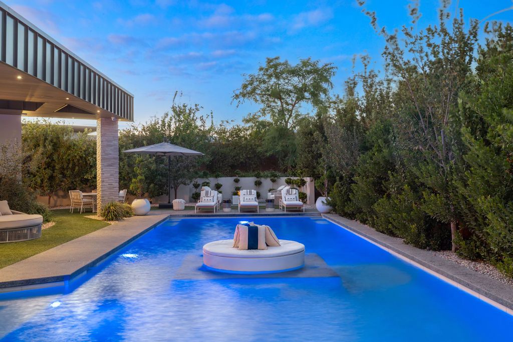 The Las Vegas Estate, a magnificent property has been completely redesigned with the finest quality finishes sitting on a half acre behind the guarded gates of Indigo in The Ridges is now available for sale. This home located at 42 Crested Cloud Way, Las Vegas, Nevada