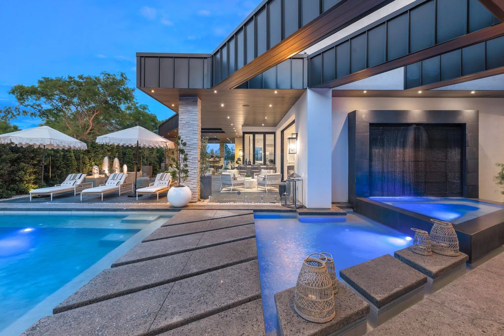 The Las Vegas Estate, a magnificent property has been completely redesigned with the finest quality finishes sitting on a half acre behind the guarded gates of Indigo in The Ridges is now available for sale. This home located at 42 Crested Cloud Way, Las Vegas, Nevada
