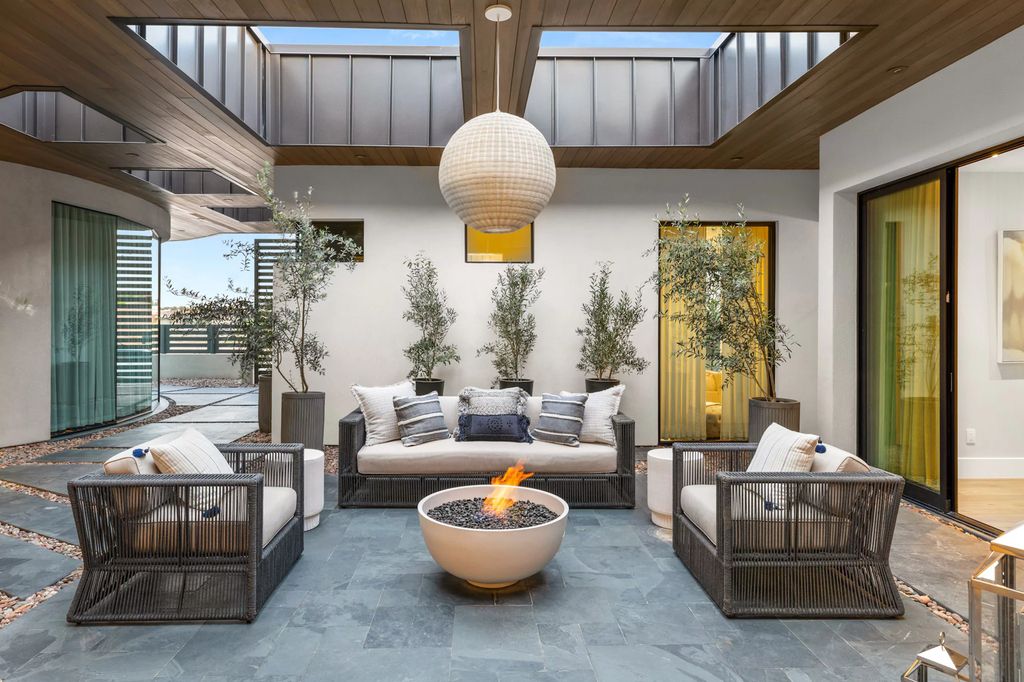 The Las Vegas Estate, a magnificent property has been completely redesigned with the finest quality finishes sitting on a half acre behind the guarded gates of Indigo in The Ridges is now available for sale. This home located at 42 Crested Cloud Way, Las Vegas, Nevada