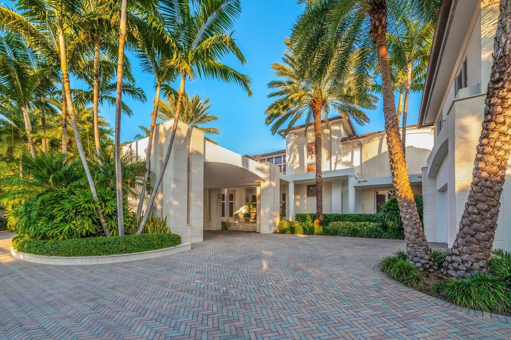 317 Ocean Boulevard, Golden Beach, Florida is an exceptional ocean front estate with luxurious amenities including formal dining room with maple paneling, movie theater, elevator, help quarters, finished basement, gym, and 2 large storage rooms. 