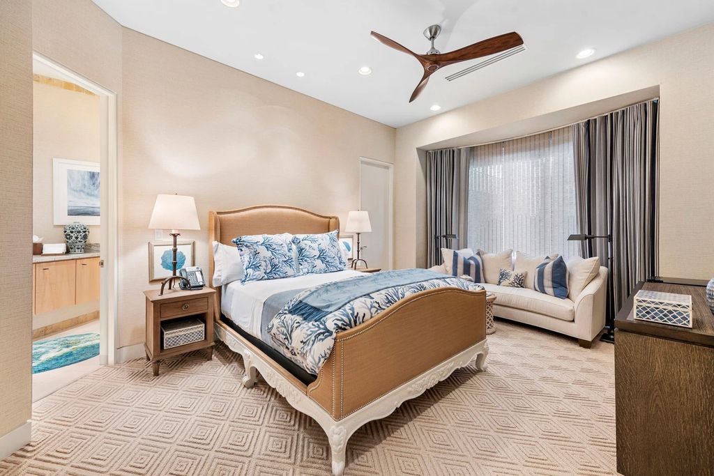 317 Ocean Boulevard, Golden Beach, Florida is an exceptional ocean front estate with luxurious amenities including formal dining room with maple paneling, movie theater, elevator, help quarters, finished basement, gym, and 2 large storage rooms. 