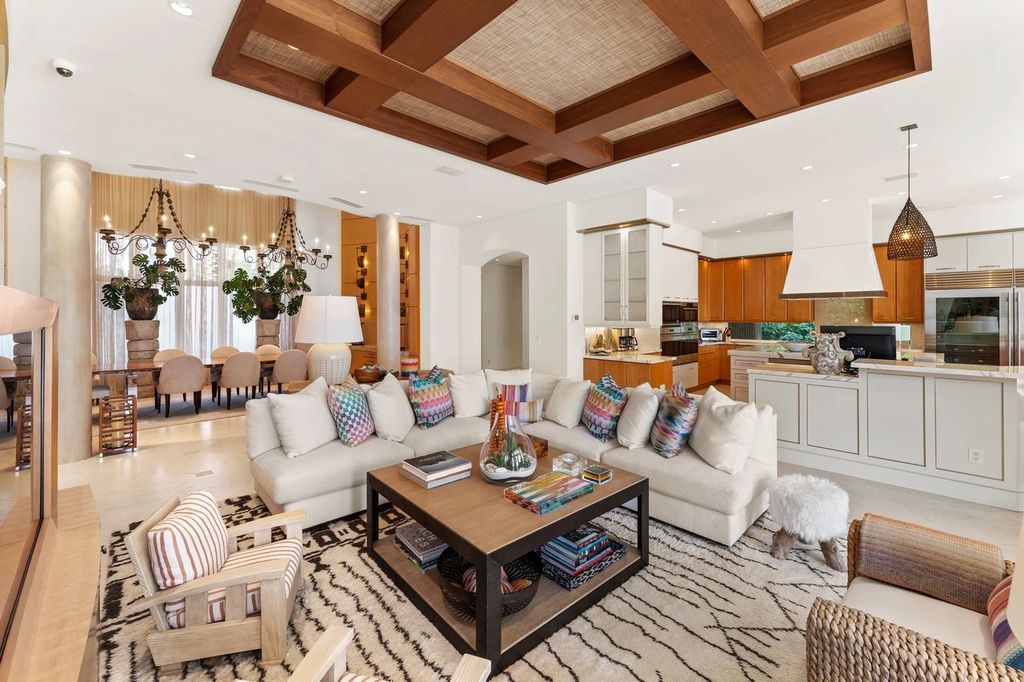 317 Ocean Boulevard, Golden Beach, Florida is an exceptional ocean front estate with luxurious amenities including formal dining room with maple paneling, movie theater, elevator, help quarters, finished basement, gym, and 2 large storage rooms. 