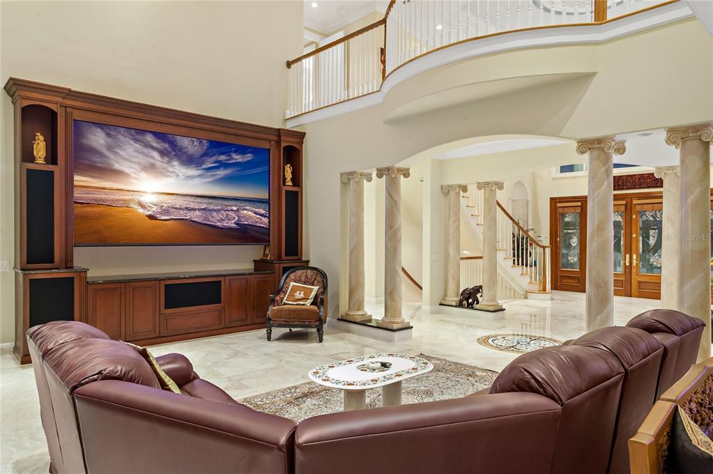 6199 54th St S, Saint Petersburg, Florida is a waterfront estate was designed to enjoy entertaining and outdoor living with expansive waterfront decks to experience a seamless indoor outdoor living with waterfall surrounded by mature privacy landscape.
