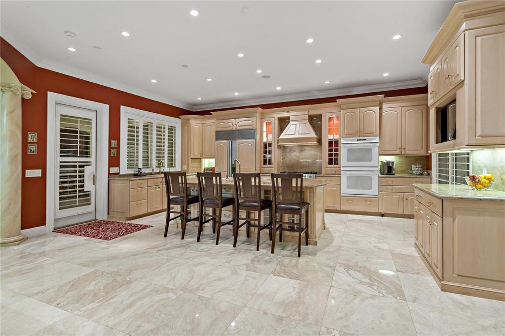 6199 54th St S, Saint Petersburg, Florida is a waterfront estate was designed to enjoy entertaining and outdoor living with expansive waterfront decks to experience a seamless indoor outdoor living with waterfall surrounded by mature privacy landscape.