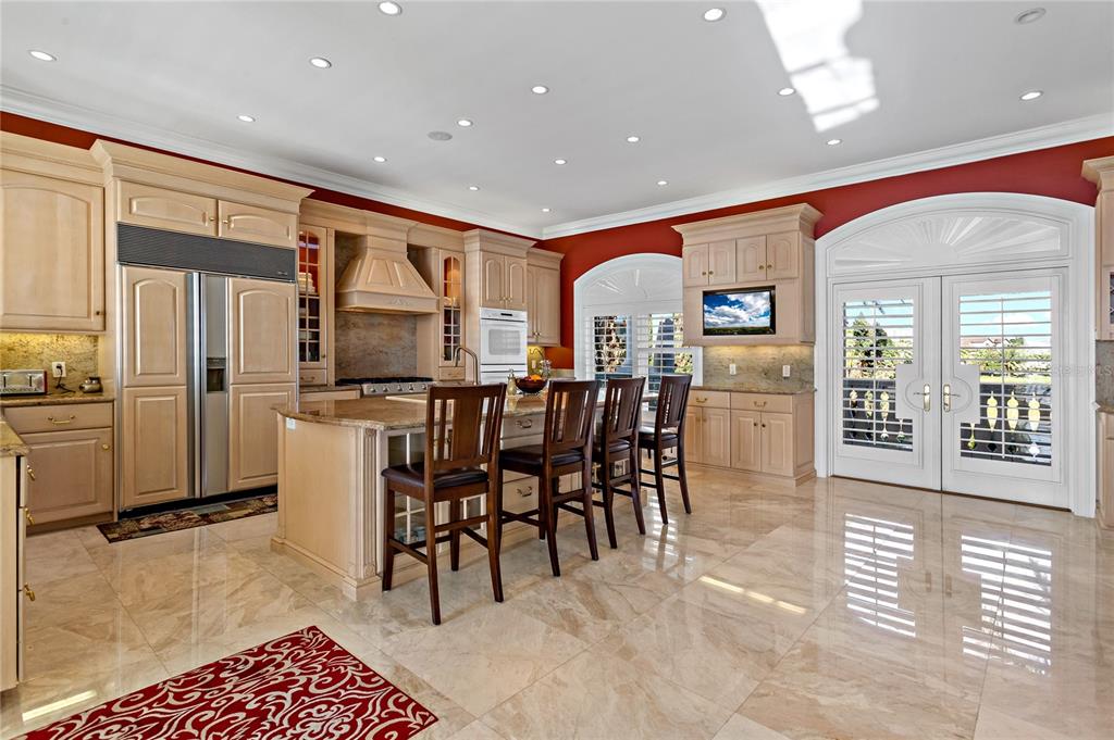 6199 54th St S, Saint Petersburg, Florida is a waterfront estate was designed to enjoy entertaining and outdoor living with expansive waterfront decks to experience a seamless indoor outdoor living with waterfall surrounded by mature privacy landscape.