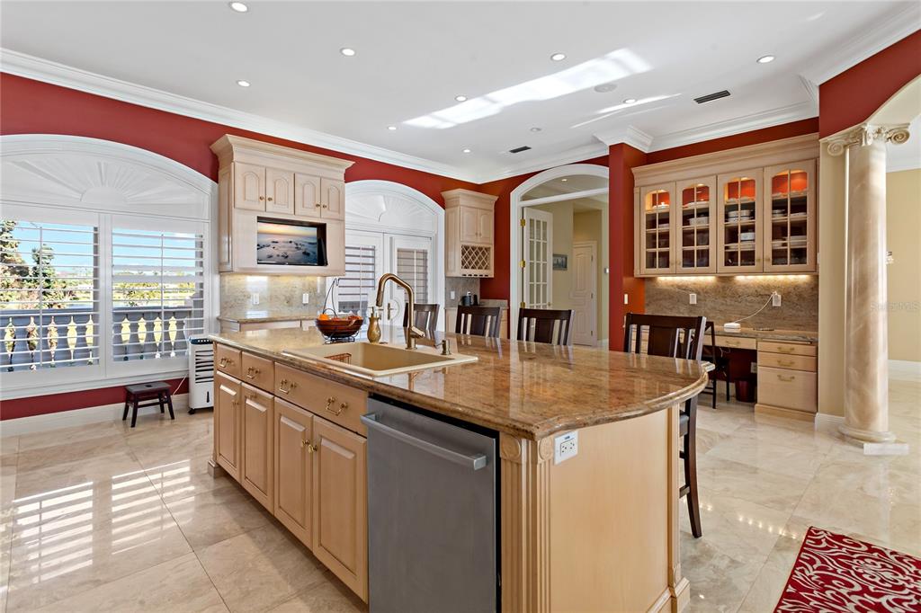 6199 54th St S, Saint Petersburg, Florida is a waterfront estate was designed to enjoy entertaining and outdoor living with expansive waterfront decks to experience a seamless indoor outdoor living with waterfall surrounded by mature privacy landscape.