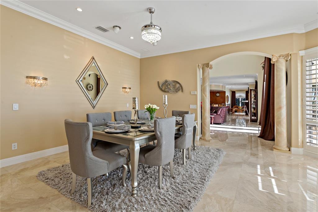 6199 54th St S, Saint Petersburg, Florida is a waterfront estate was designed to enjoy entertaining and outdoor living with expansive waterfront decks to experience a seamless indoor outdoor living with waterfall surrounded by mature privacy landscape.