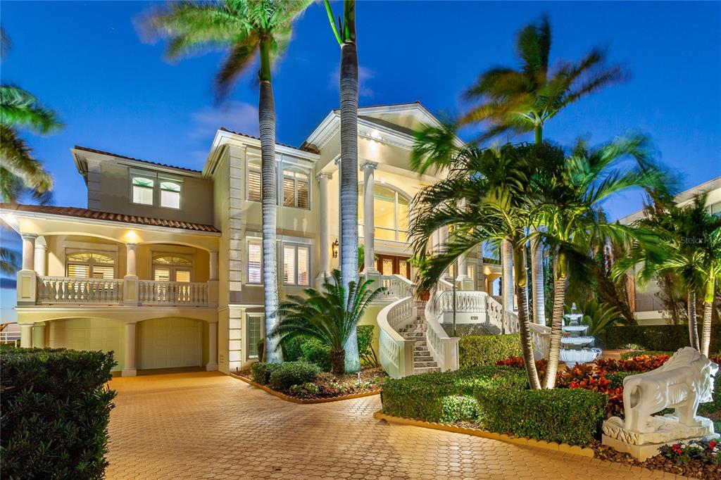 6199 54th St S, Saint Petersburg, Florida is a waterfront estate was designed to enjoy entertaining and outdoor living with expansive waterfront decks to experience a seamless indoor outdoor living with waterfall surrounded by mature privacy landscape.