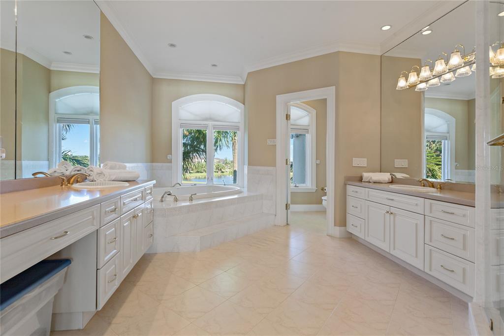 6199 54th St S, Saint Petersburg, Florida is a waterfront estate was designed to enjoy entertaining and outdoor living with expansive waterfront decks to experience a seamless indoor outdoor living with waterfall surrounded by mature privacy landscape.
