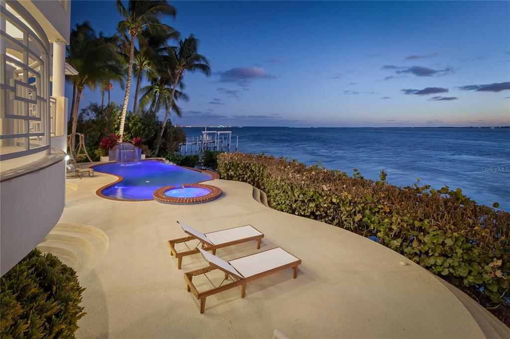 6199 54th St S, Saint Petersburg, Florida is a waterfront estate was designed to enjoy entertaining and outdoor living with expansive waterfront decks to experience a seamless indoor outdoor living with waterfall surrounded by mature privacy landscape.