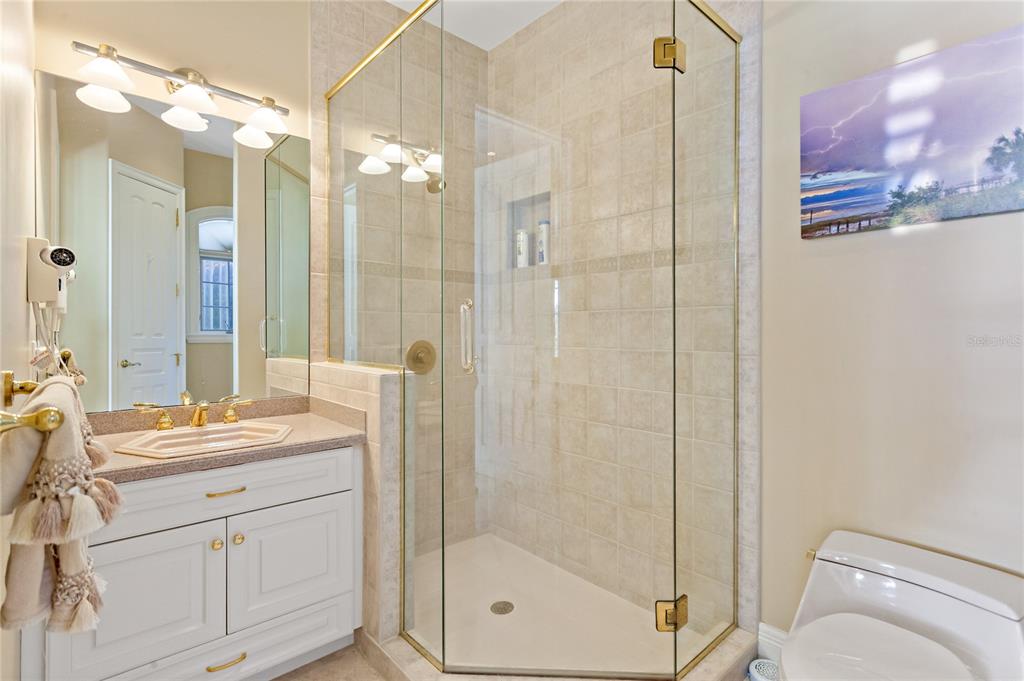 6199 54th St S, Saint Petersburg, Florida is a waterfront estate was designed to enjoy entertaining and outdoor living with expansive waterfront decks to experience a seamless indoor outdoor living with waterfall surrounded by mature privacy landscape.