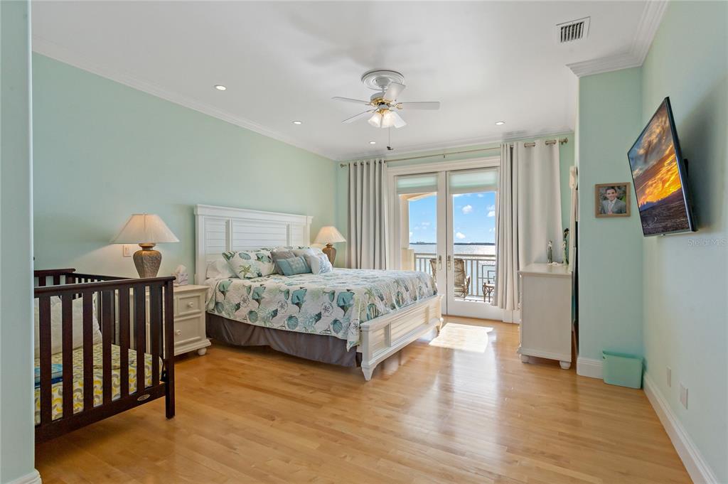 6199 54th St S, Saint Petersburg, Florida is a waterfront estate was designed to enjoy entertaining and outdoor living with expansive waterfront decks to experience a seamless indoor outdoor living with waterfall surrounded by mature privacy landscape.