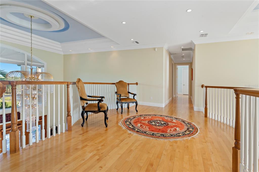 6199 54th St S, Saint Petersburg, Florida is a waterfront estate was designed to enjoy entertaining and outdoor living with expansive waterfront decks to experience a seamless indoor outdoor living with waterfall surrounded by mature privacy landscape.