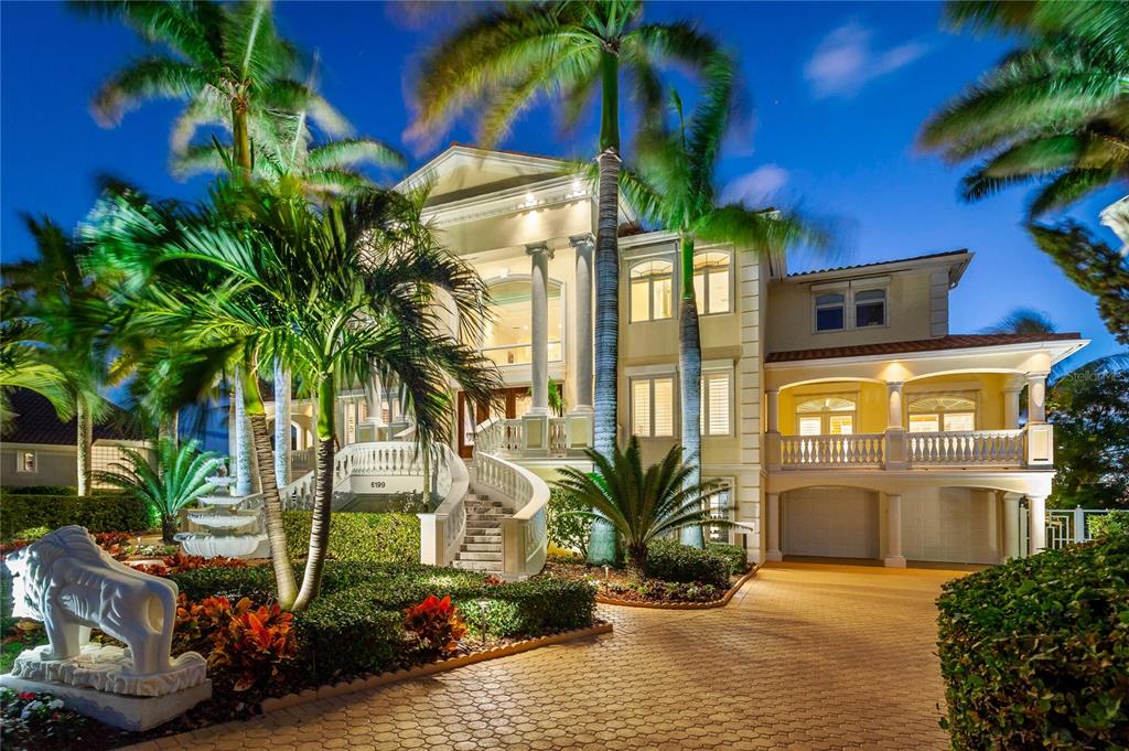 6199 54th St S, Saint Petersburg, Florida is a waterfront estate was designed to enjoy entertaining and outdoor living with expansive waterfront decks to experience a seamless indoor outdoor living with waterfall surrounded by mature privacy landscape.