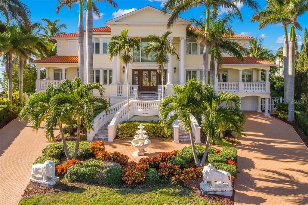 6199 54th St S, Saint Petersburg, Florida is a waterfront estate was designed to enjoy entertaining and outdoor living with expansive waterfront decks to experience a seamless indoor outdoor living with waterfall surrounded by mature privacy landscape.