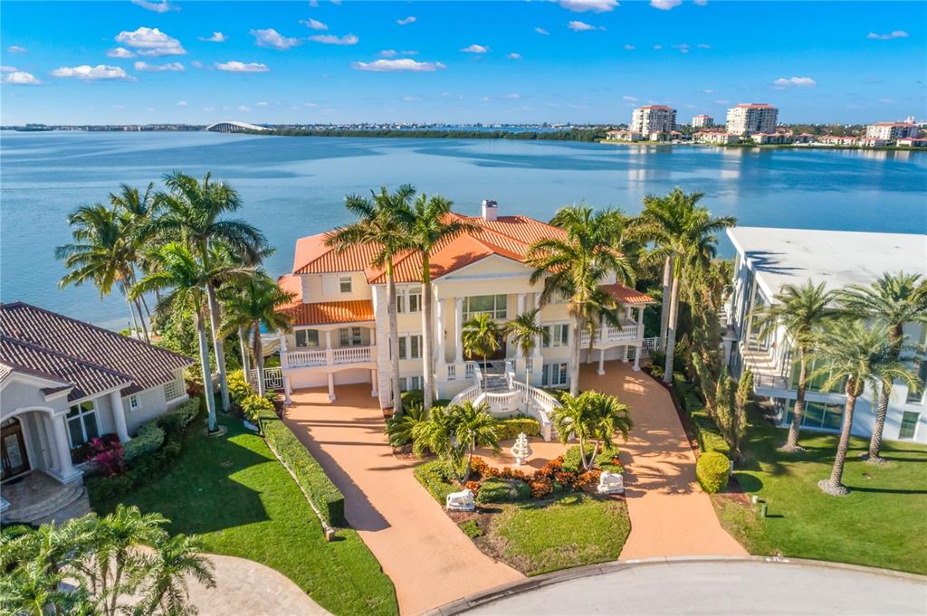 6199 54th St S, Saint Petersburg, Florida is a waterfront estate was designed to enjoy entertaining and outdoor living with expansive waterfront decks to experience a seamless indoor outdoor living with waterfall surrounded by mature privacy landscape.