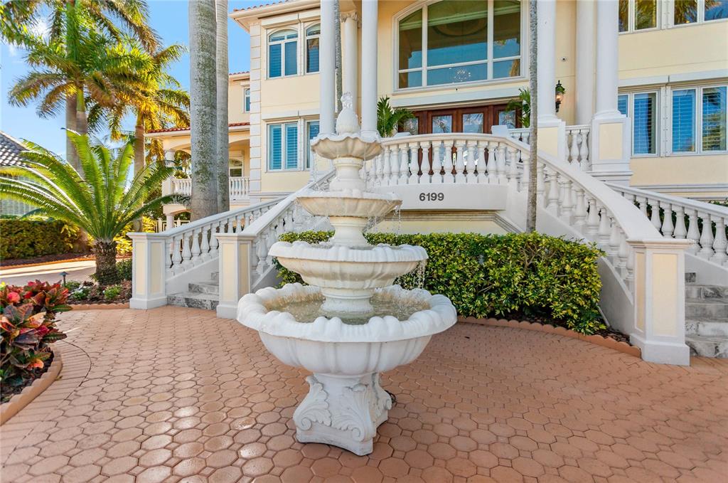6199 54th St S, Saint Petersburg, Florida is a waterfront estate was designed to enjoy entertaining and outdoor living with expansive waterfront decks to experience a seamless indoor outdoor living with waterfall surrounded by mature privacy landscape.