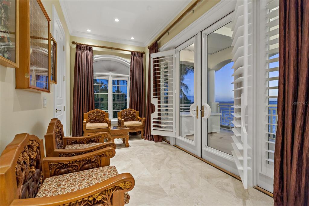 6199 54th St S, Saint Petersburg, Florida is a waterfront estate was designed to enjoy entertaining and outdoor living with expansive waterfront decks to experience a seamless indoor outdoor living with waterfall surrounded by mature privacy landscape.