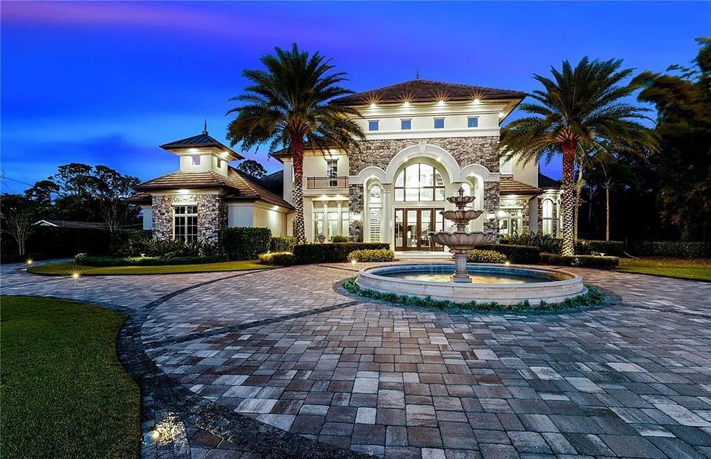 482 Ridge Drive, Naples, Florida, is located in a desirable Naples neighborhood, just minutes from Vanderbilt Beach, Mercato, and Waterside shops. This stunning home was built with meticulous attention to detail, including a butterfly staircase and marble floors.