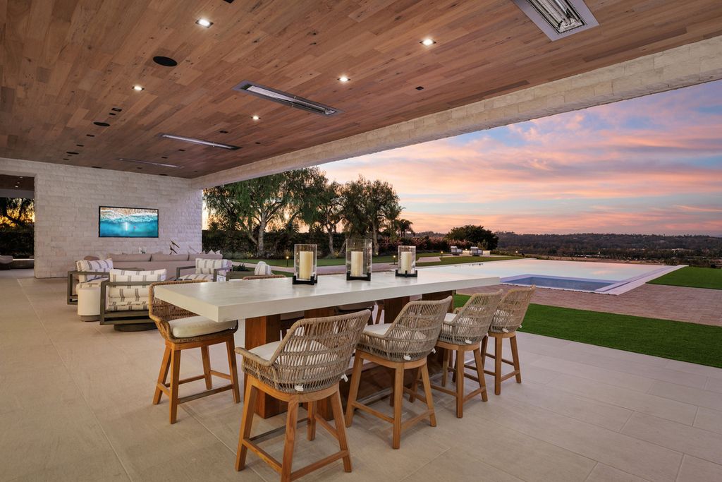 5940 Ladys Secret Drive, Rancho Santa Fe, California is a brand new estate tucked away in a convenient and prestigious gated community and sitting on a premier 2.43 acre site boasting the epitome of Resort Living.