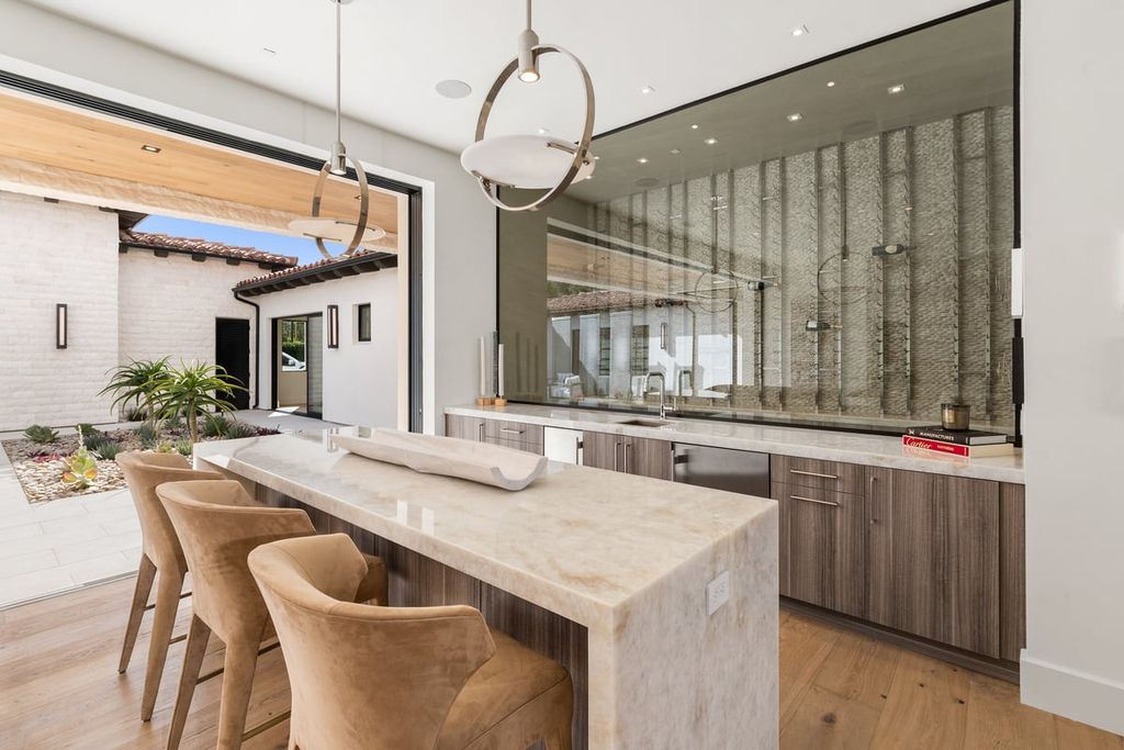 5940 Ladys Secret Drive, Rancho Santa Fe, California is a brand new estate tucked away in a convenient and prestigious gated community and sitting on a premier 2.43 acre site boasting the epitome of Resort Living.