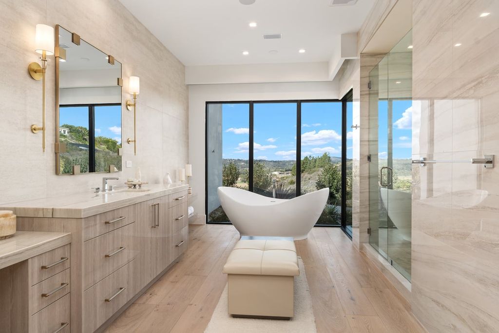 5940 Ladys Secret Drive, Rancho Santa Fe, California is a brand new estate tucked away in a convenient and prestigious gated community and sitting on a premier 2.43 acre site boasting the epitome of Resort Living.