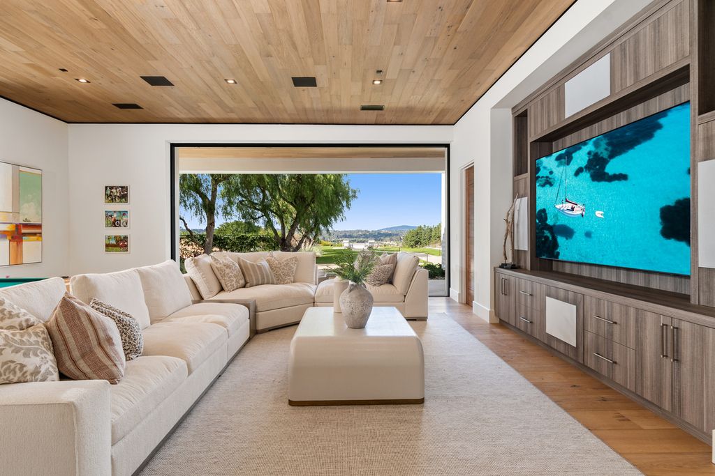 5940 Ladys Secret Drive, Rancho Santa Fe, California is a brand new estate tucked away in a convenient and prestigious gated community and sitting on a premier 2.43 acre site boasting the epitome of Resort Living.
