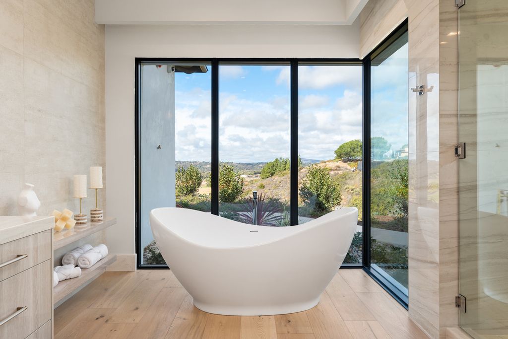 5940 Ladys Secret Drive, Rancho Santa Fe, California is a brand new estate tucked away in a convenient and prestigious gated community and sitting on a premier 2.43 acre site boasting the epitome of Resort Living.