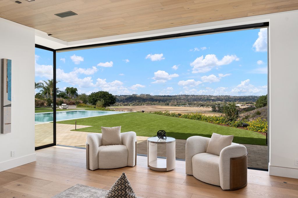5940 Ladys Secret Drive, Rancho Santa Fe, California is a brand new estate tucked away in a convenient and prestigious gated community and sitting on a premier 2.43 acre site boasting the epitome of Resort Living.