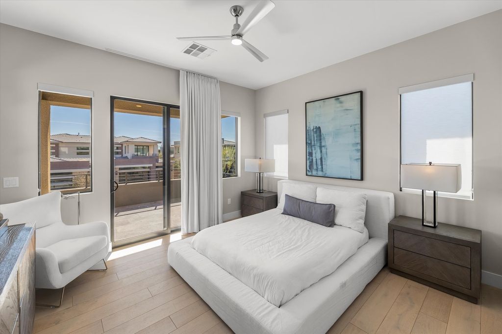 11448 Opal Springs Way, Las Vegas, Nevada is a guard-gated designer dream home with updated amenities including French oak hardwood flooring, silver travertine decking, closets, light fixtures, Control4 home automation, whole-home sound, and more.