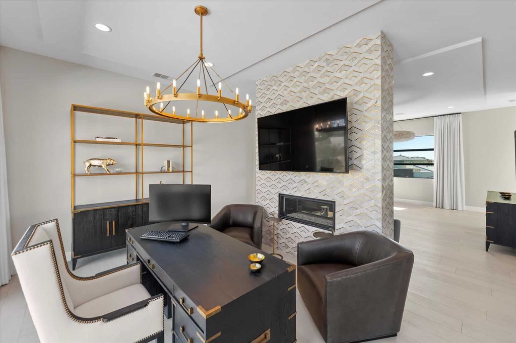 11448 Opal Springs Way, Las Vegas, Nevada is a guard-gated designer dream home with updated amenities including French oak hardwood flooring, silver travertine decking, closets, light fixtures, Control4 home automation, whole-home sound, and more.
