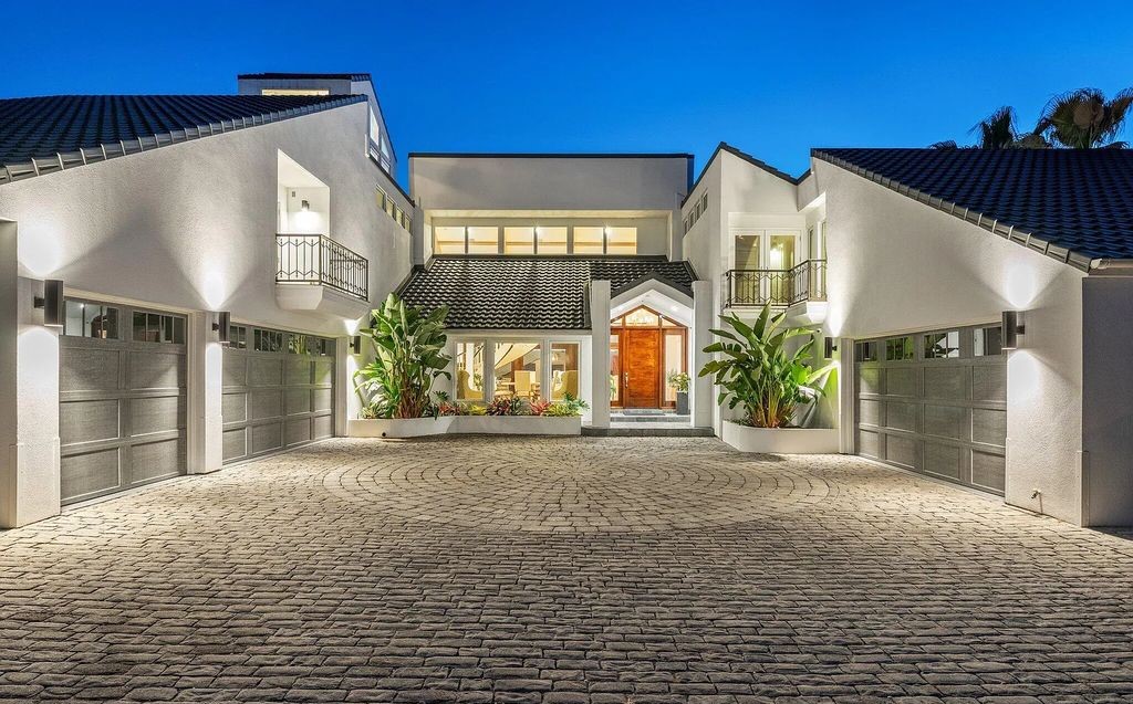 4600 Bay Point Road, Panama City Beach, Florida, is an exceptionally luxurious home with a Tropical Poolside Oasis with smart furnishings, soaring vaulted wood beam ceilings, a curving staircase, and an expansive living room featuring a well-appointed fireplace and triple French doors that lead to the elevated deck. This Home in Panama City Beach offers 6 bedrooms and 8 bathrooms with over 6.000 square feet of living spaces.
