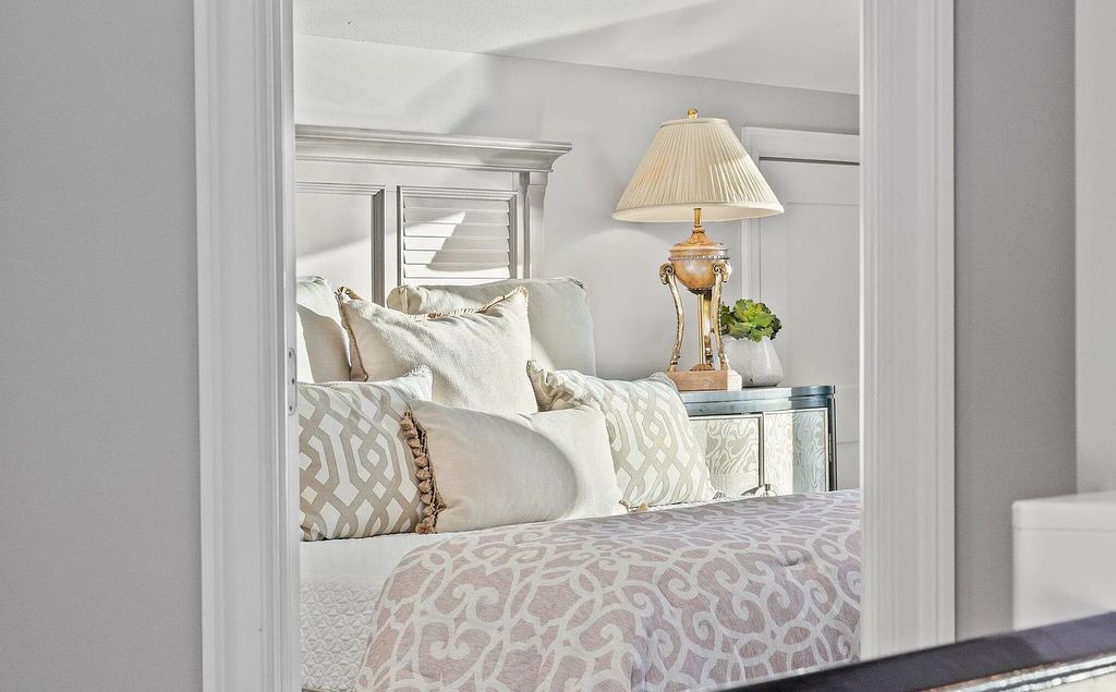 4600 Bay Point Road, Panama City Beach, Florida, is an exceptionally luxurious home with a Tropical Poolside Oasis with smart furnishings, soaring vaulted wood beam ceilings, a curving staircase, and an expansive living room featuring a well-appointed fireplace and triple French doors that lead to the elevated deck. This Home in Panama City Beach offers 6 bedrooms and 8 bathrooms with over 6.000 square feet of living spaces.