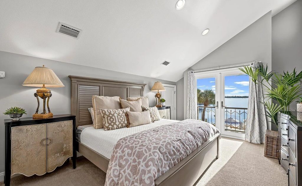 4600 Bay Point Road, Panama City Beach, Florida, is an exceptionally luxurious home with a Tropical Poolside Oasis with smart furnishings, soaring vaulted wood beam ceilings, a curving staircase, and an expansive living room featuring a well-appointed fireplace and triple French doors that lead to the elevated deck. This Home in Panama City Beach offers 6 bedrooms and 8 bathrooms with over 6.000 square feet of living spaces.