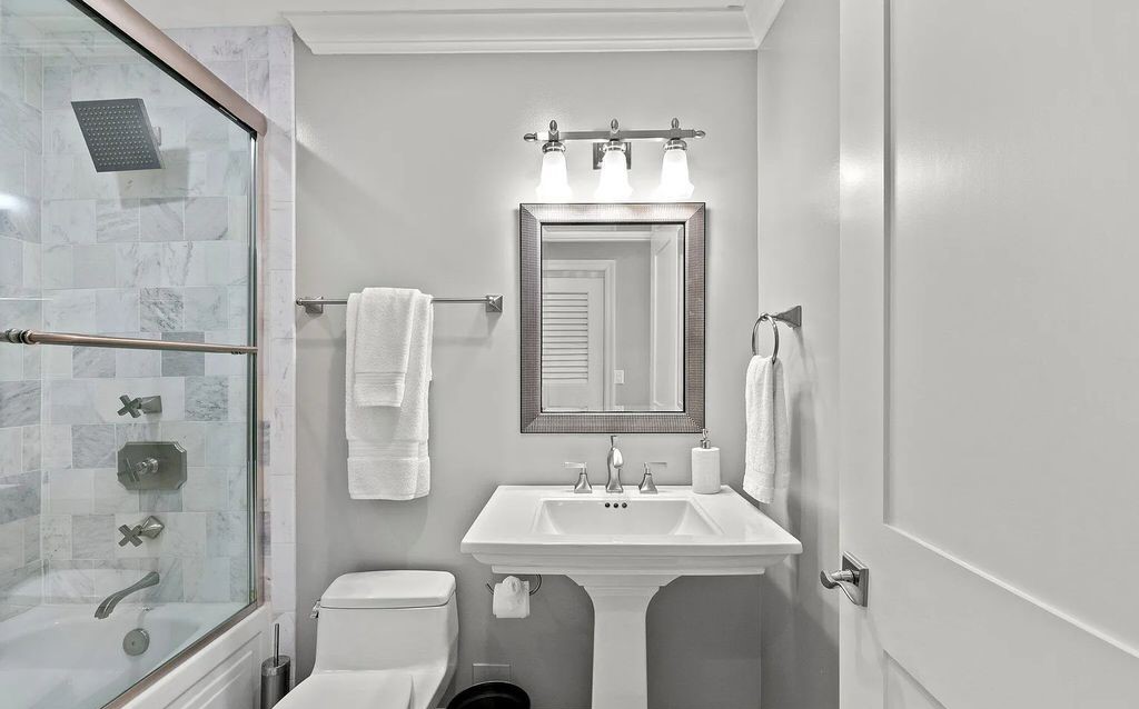 4600 Bay Point Road, Panama City Beach, Florida, is an exceptionally luxurious home with a Tropical Poolside Oasis with smart furnishings, soaring vaulted wood beam ceilings, a curving staircase, and an expansive living room featuring a well-appointed fireplace and triple French doors that lead to the elevated deck. This Home in Panama City Beach offers 6 bedrooms and 8 bathrooms with over 6.000 square feet of living spaces.