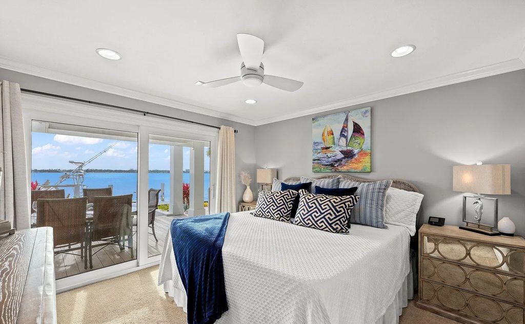 4600 Bay Point Road, Panama City Beach, Florida, is an exceptionally luxurious home with a Tropical Poolside Oasis with smart furnishings, soaring vaulted wood beam ceilings, a curving staircase, and an expansive living room featuring a well-appointed fireplace and triple French doors that lead to the elevated deck. This Home in Panama City Beach offers 6 bedrooms and 8 bathrooms with over 6.000 square feet of living spaces.