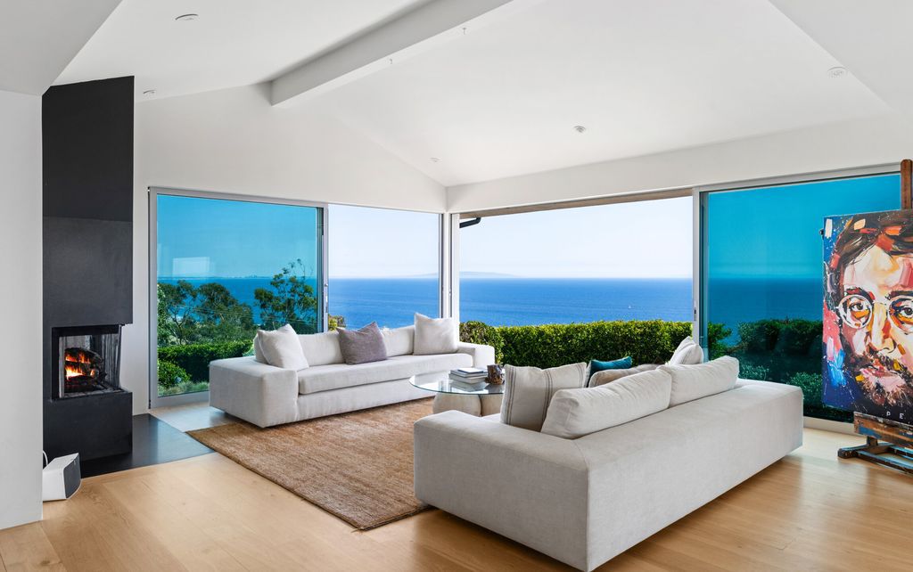 22407 Carbon Mesa Road, Malibu, California is truly a golfer's retreat in a spectacular, verdant setting on a gated promontory of more than two manicured acres on two parcels, views that take in a panorama of ocean, islands, and coastline from Point Dume and the Malibu Pier to Palos Verdes.