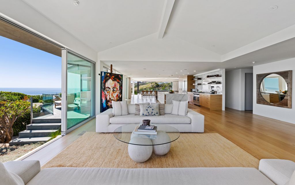 22407 Carbon Mesa Road, Malibu, California is truly a golfer's retreat in a spectacular, verdant setting on a gated promontory of more than two manicured acres on two parcels, views that take in a panorama of ocean, islands, and coastline from Point Dume and the Malibu Pier to Palos Verdes.