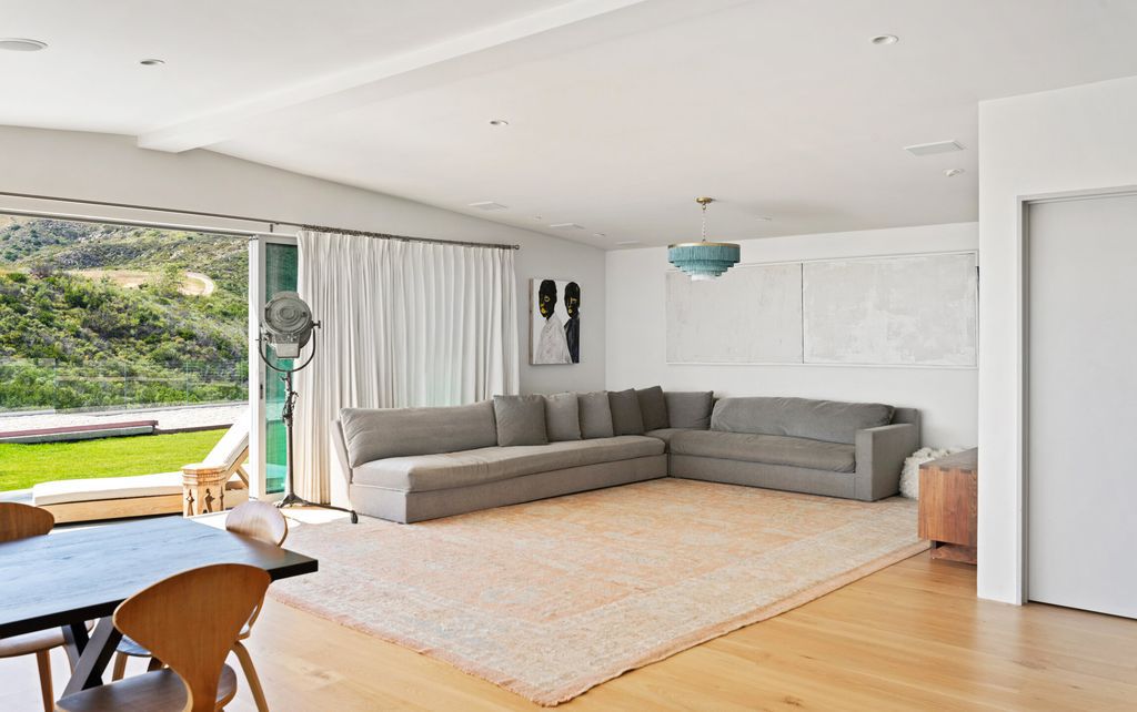 22407 Carbon Mesa Road, Malibu, California is truly a golfer's retreat in a spectacular, verdant setting on a gated promontory of more than two manicured acres on two parcels, views that take in a panorama of ocean, islands, and coastline from Point Dume and the Malibu Pier to Palos Verdes.