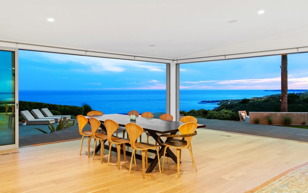 22407 Carbon Mesa Road, Malibu, California is truly a golfer's retreat in a spectacular, verdant setting on a gated promontory of more than two manicured acres on two parcels, views that take in a panorama of ocean, islands, and coastline from Point Dume and the Malibu Pier to Palos Verdes.
