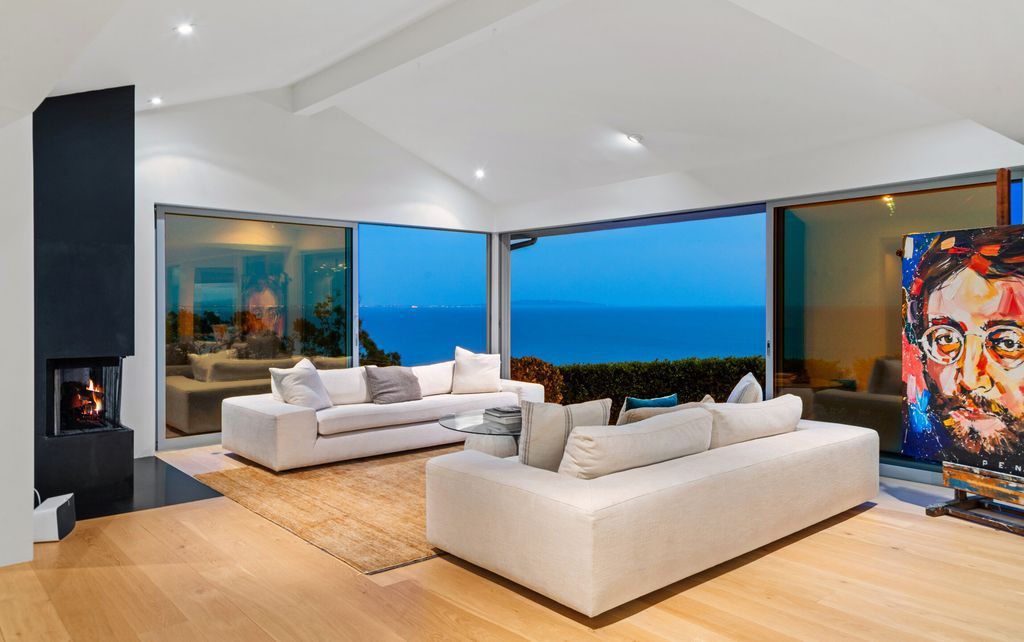 22407 Carbon Mesa Road, Malibu, California is truly a golfer's retreat in a spectacular, verdant setting on a gated promontory of more than two manicured acres on two parcels, views that take in a panorama of ocean, islands, and coastline from Point Dume and the Malibu Pier to Palos Verdes.