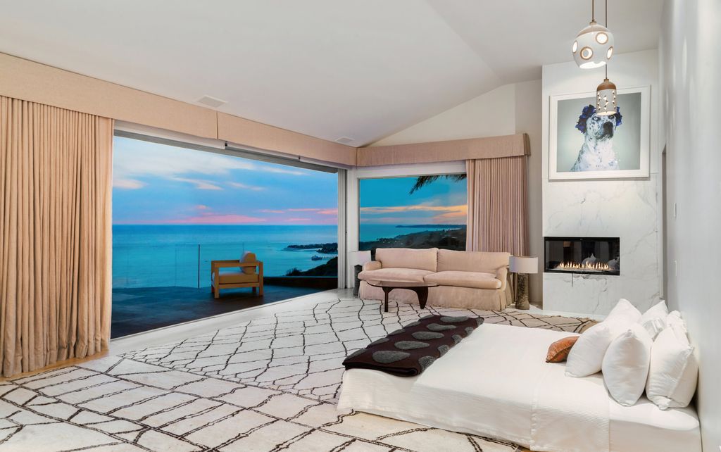 22407 Carbon Mesa Road, Malibu, California is truly a golfer's retreat in a spectacular, verdant setting on a gated promontory of more than two manicured acres on two parcels, views that take in a panorama of ocean, islands, and coastline from Point Dume and the Malibu Pier to Palos Verdes.