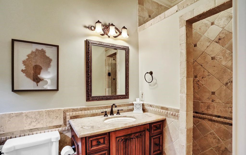 13897 Bella Riva Lane, Jacksonville, Florida, is located on the intracoastal waterway in prestigious Queen's Harbour and is perfect for formal or casual entertaining. The elegant, contemporary home has a 2-story layout with panoramic vistas of the Intracoastal and marshes, offering privacy and spectacular views.