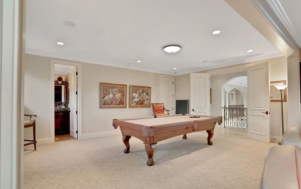 13897 Bella Riva Lane, Jacksonville, Florida, is located on the intracoastal waterway in prestigious Queen's Harbour and is perfect for formal or casual entertaining. The elegant, contemporary home has a 2-story layout with panoramic vistas of the Intracoastal and marshes, offering privacy and spectacular views.