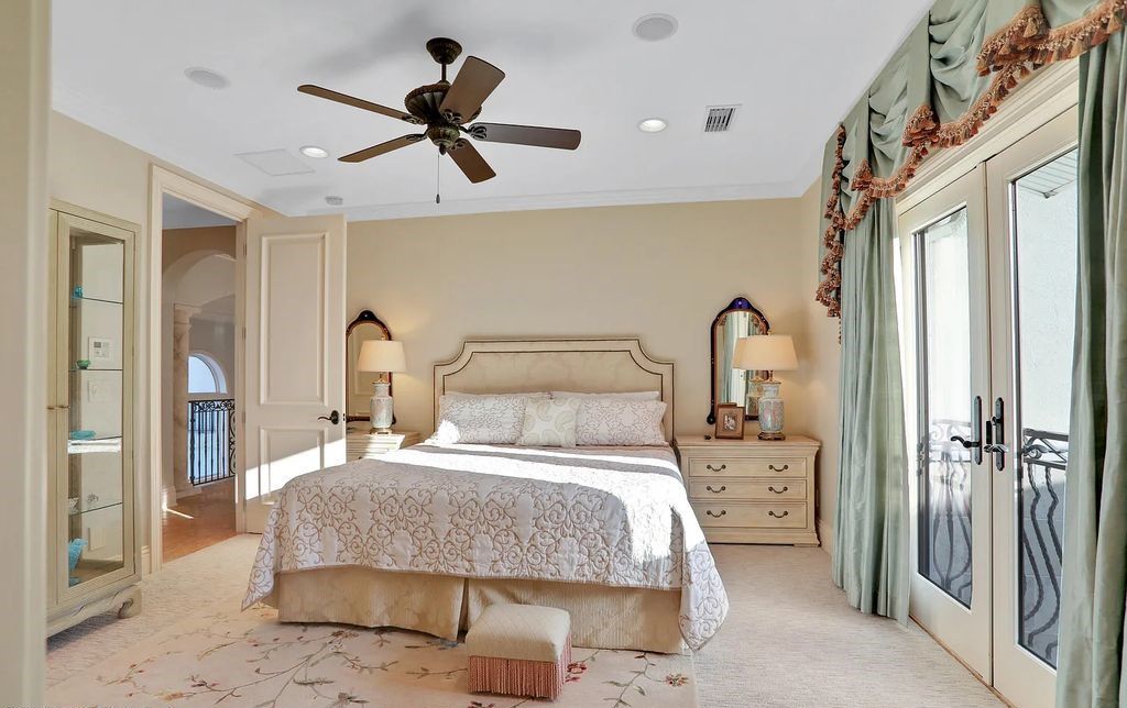 13897 Bella Riva Lane, Jacksonville, Florida, is located on the intracoastal waterway in prestigious Queen's Harbour and is perfect for formal or casual entertaining. The elegant, contemporary home has a 2-story layout with panoramic vistas of the Intracoastal and marshes, offering privacy and spectacular views.