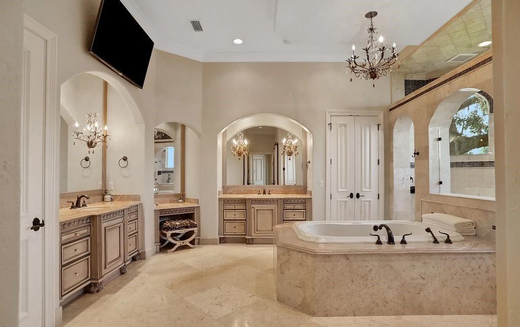 13897 Bella Riva Lane, Jacksonville, Florida, is located on the intracoastal waterway in prestigious Queen's Harbour and is perfect for formal or casual entertaining. The elegant, contemporary home has a 2-story layout with panoramic vistas of the Intracoastal and marshes, offering privacy and spectacular views.