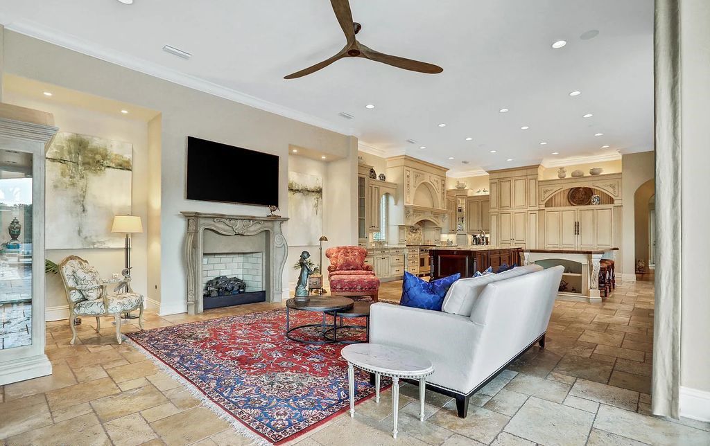 13897 Bella Riva Lane, Jacksonville, Florida, is located on the intracoastal waterway in prestigious Queen's Harbour and is perfect for formal or casual entertaining. The elegant, contemporary home has a 2-story layout with panoramic vistas of the Intracoastal and marshes, offering privacy and spectacular views.